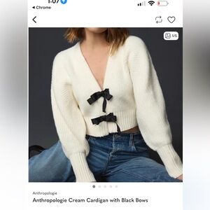 Anthropologie Cream Cardigan with Black Bow Details